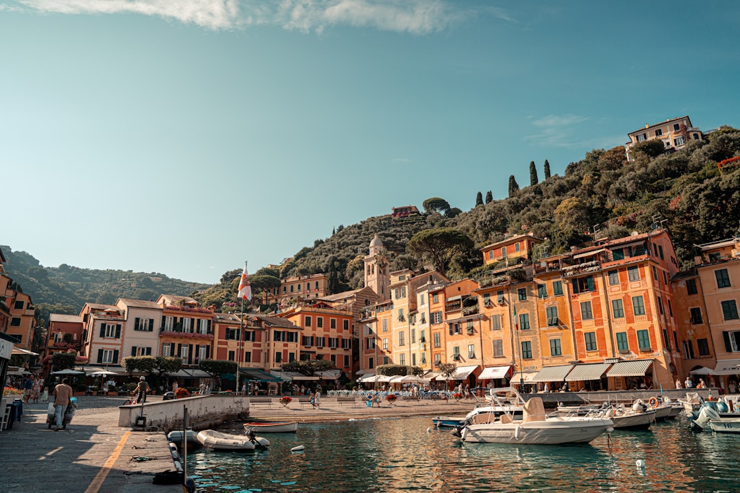 Harbor view with colorful buildings and boats.